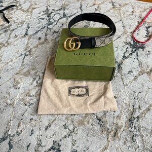 Gucci authentic Designer Gold and Black Belt